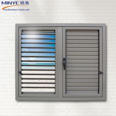 an open window with shutters on the outside