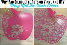 an apple cut out with pink paper and some scissors on top of the cutting board