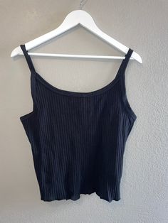 "Black ribbed tank top  Great Condition Measurements Bust 36-38\"  Length 20.5\"  Cotton/spandex" Casual Black Scoop Neck Vest, Black Ribbed Scoop Neck Tank Top, Black Stretch Scoop Neck Tank Top, Casual Ribbed Vest With Tank Straps, Trendy Ribbed Tank Top With Spaghetti Straps, Stretch Ribbed Scoop Neck Vest, Trendy Ribbed Spaghetti Strap Tank Top, Fitted Black Camisole Top, Fitted Black Tank Crop Top