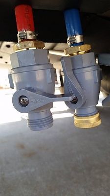 two valves attached to the side of a vehicle