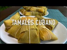 tamales on a plate with the words tamales cubano