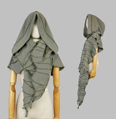 The hooded scarf has an oversized hood. The scarf is great long and width. This creation is completely made out of my organic cotton offcuts with makes it a unique one of a kind piece.  With inside out seaming what gives this piece a sculpture feeling. You will look lovable in this design. It is an easy to wear piece that you can combine with almost every wardrobe. This piece will bring you closer to the fairytale in modern times.  Designed and handmade by Solmode. * Material: Thick green organi Giant Scarf, Oversized Cotton Hoodie With Detachable Hood, Techwear Cotton Hooded Jacket With Detachable Hood, Oversized Hooded Outdoor Cape, Cotton Techwear Hooded Jacket With Double-lined Hood, Victorian Shawl, Techwear Long-sleeved Hooded Jacket With Detachable Hood, Victorian Cape, Thick Scarf