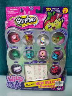 an assortment of littlest pet toys in a package