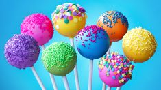 colorful cake pops with sprinkles on blue background stock images and royalty photos