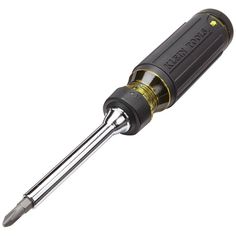 a black and gold screwdriver on a white background