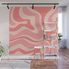 a pink and white wall mural in an office