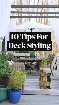 an outdoor patio with chairs, tables and potted plants on the decking area