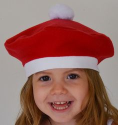 Christmas Hat Red and White Festive French Beret with Pompom Celebrate the Holidays or anytime. For both boys and girls. Babies, Toddlers, Children This hat is made from a soft fleece. The band is stretchy for a comfortable fit. This hat is available in the following sizes: X Small-Newborn-3mo.(15 inches circumference) Small-4-24 mo. (16 1/2 in.) Medium-2T-3T (18 - 19 in.) and Large- 4-9 Years (20 - 21 in.) It is easier to fit the hat to the child if you measure the child's head where the hat is Kids Fleece Hats, Christmas Beanie, Fleece Patterns, French Beret, Kids Beanies, Fleece Hat, Kids Fleece, Outer Wear, Baby Hat