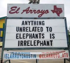 a sign that says el arrogo anything unrelated to elephants is irrelephant