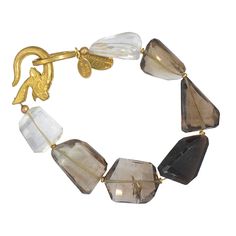 Hand faceted quartz stones are finished with a hand cast ibex clasp. 7.5" [19 cm] long. Palm Cuff, Scarab Bracelet, Horse Bracelet, Hair Necklace, Gold Horse, Gold Feathers, Labradorite Bracelet, Purple Pearl, Beaded Wraps