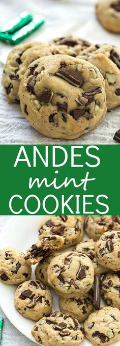 cookies with chocolate chips and mints are on a white plate next to green forks