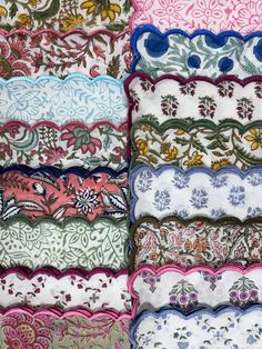 many different types of decorative fabric on display