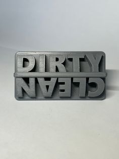 there is a metal sign that says dirty nvetd on the side of it