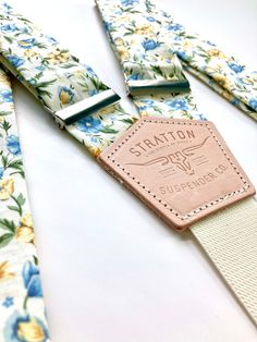 This Victorian Bespoke Floral Pattern is paired with a cream colored elastic to give you a vintage look that will be the perfect accessory for work, weddings, or weekends. Dress them up or down, the subtle yet intricate floral design will have everyone saying “Wow! Those are beautiful!” Button On Color Attachments as Shown in FIRST PHOTO: Tan, Cognac, and Chocolate (As shown above, from top to bottom) We stand by the same 100% money back guarantee as our Stratton Suspender Clasp Sets - We can pr Suspender Clips, Suspenders Set, Well Woven, Veg Tan Leather, Linen Set, Fine Linen, Blue Bonnets, Sand Beige, Leather Pieces