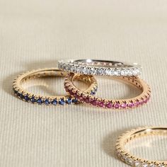 This modern take on an eternity ring features a full circle band of delicate yet sparkly natural emerald gemstones from the Juliette Maison™ collection. Fashioned in 10K rose gold, Wear to add a subtle sparkle to any finger, or style as an accent to your go-to stack of rings. Rose Gold Half Eternity Stackable Rings, Stackable Everyday Luxury Rings, Rose Gold Eternity Band With Halo, Luxury Rose Gold Round Eternity Band, Rose Gold Round Cut Eternity Band With Halo, Rose Gold Halo Round Cut Eternity Band, Rose Gold Halo Eternity Band, Rose Gold Round Eternity Band Fine Jewelry, Rose Gold Half Eternity Band Fine Jewelry