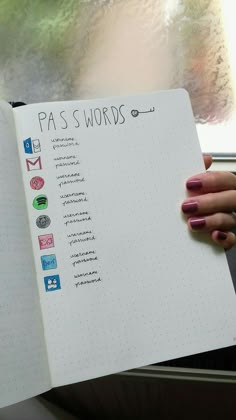 a person holding a notebook with the words pa's words written on it