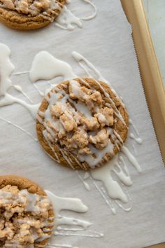 iced cookies with icing on a baking sheet