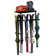 a rack that has skis and snowboards on it