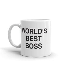 a white coffee mug with the words world's best boss printed in black on it