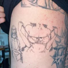 a person with a tattoo on their stomach