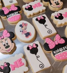 some decorated cookies with minnie mouse on them