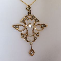 14 Karat gold Diamond and seed Pearl Victorian pendent, circa 1880s  18 inch new medium weight 14 Karat gold chain  Authentic American Antique 140 yrs old in excellent condition Free UPS Shipping Ups Shipping, American Antiques, Seed Pearl, Vintage Watches, Medium Weight, Gold Chain, Antique Jewelry, Gold Diamond, Vintage Antiques