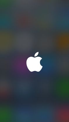 an apple logo is shown on a blurry background