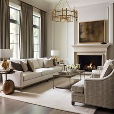 a living room filled with furniture and a fire place in front of two large windows