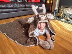 ** This listing is for the 2in1 Woodland Deer Hooded Blanket CROCHET PATTERN ONLY IN US TERMS WRITTEN IN ENGLISH ** I AM HERE TO HELP! IF YOU HAVE ANY ISSUES WITH THIS PATTERN I AM HERE TO HELP YOU GET UNSTUCK AND FINISH YOUR ITEM. BUY WITH CONFIDENCE. Don't miss other Crafting Happiness patterns here: https://www.etsy.com/shop/CraftingHappinessUK What a great idea! This beautiful 2in1 blanket is also a decoration for your room. Use it to keep warm and snugly, and when you are done with it, fold it and display it on your sofa, armchair or bed. The hooded blanket is suitable for girls or boys alike and would look gorgeous folded away on your sofa. Designed to be a full-body blanket. Made with super chunky (super bulky / #6) yarn, this blanket is warm and soft and works up in no time. CROCHE Hooded Blanket Crochet, Super Chunky Blanket, Crochet Woodland, Deer Blanket, Woodland Bunny, Deer Pillow, Christmas Presents For Kids, Deer Fawn, Woodland Deer