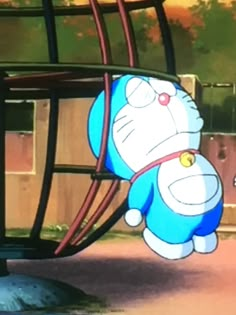 an animated image of a cartoon character hanging from a metal structure with another character in the background