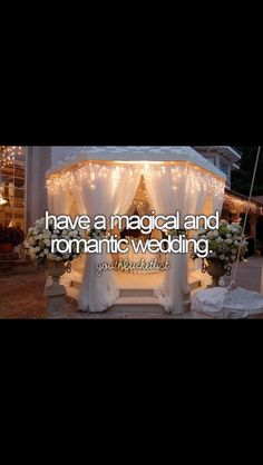 a white gazebo with lights and flowers on it that says, have a magical and romantic wedding