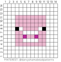 a pink and black square with a face drawn on it