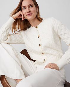 Cast in a textured stitch, our cable cardigan is equal parts substance and style. Crew neck. Long sleeves. Button front. Drop shoulders.,Imported:Imported,Fit:Softly fitted,Length:20 1/2" long,Fabrication:100% Cotton,Garment Care:Machine Washable Drop Shoulder Cable Cardigan by Ann Taylor Size regular - Medium Winter White Women's 100%, Cotton, Crew, Neck, Long, Sleeve, Cardigan, Sweaters, 100%, Cotton, Machine, Washable Shoulder Cable, Ann Taylor Petite, Petite Sweaters, Cable Cardigan, Cardigan Sweaters, Sleeve Cardigan, Winter White, Long Sleeve Cardigan, Drop Shoulder