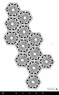 an image of a black and white pattern that looks like hexagonals with stars