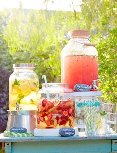 a table topped with jars filled with drinks