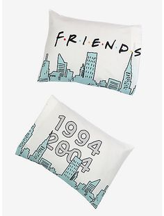 two pillow cases with the words friends printed on them, one in blue and white