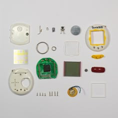 various electronic components laid out on a white surface