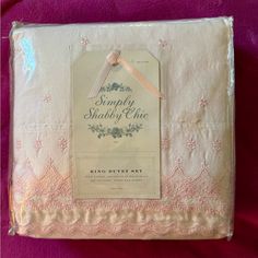 the package is packaged in pink and white with an elegant lace design on it's side