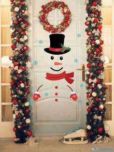 a decorated door with a snowman and wreath on it's side, surrounded by christmas decorations