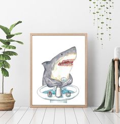 a shark is on top of a plate in front of a plant and potted plant