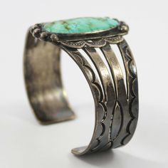 1940s Navajo Sterling Silver Fred Harvey Style Cuff Bracelet with Hand Stamped Designs and set with Natural American Turquoise. 1.5” Cuff Width5.5” Inside Measurement, plus 1” opening(6.5" Total Circumference - Medium) Zuni Jewelry, Concho Belt, Navajo Jewelry, American Turquoise, Native Jewelry, Pendant Rings, Stamp Design, Metal Work, Black Stone