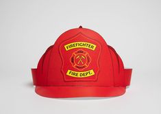 a red fire hat with the words firefighters on it's front and back side