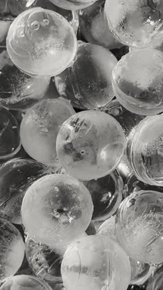 black and white photograph of ice bubbles in water