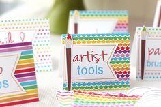 several colorful cards with the words artist tools on them