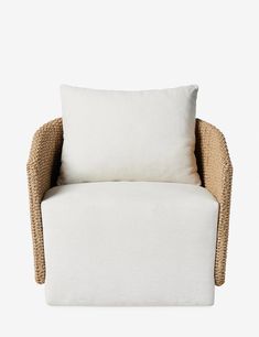 a white and brown chair with a pillow on it's backrest, against a white background