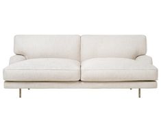 a white couch sitting on top of a wooden frame