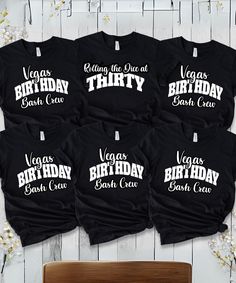 four black birthday shirts with white lettering on them