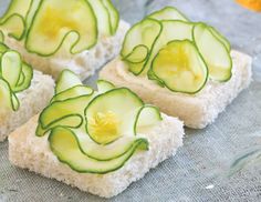 cucumber slices are arranged on top of bread