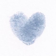 a fingerprint in the shape of a heart on a white background with blue ink