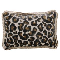 a leopard print pillow on a white background